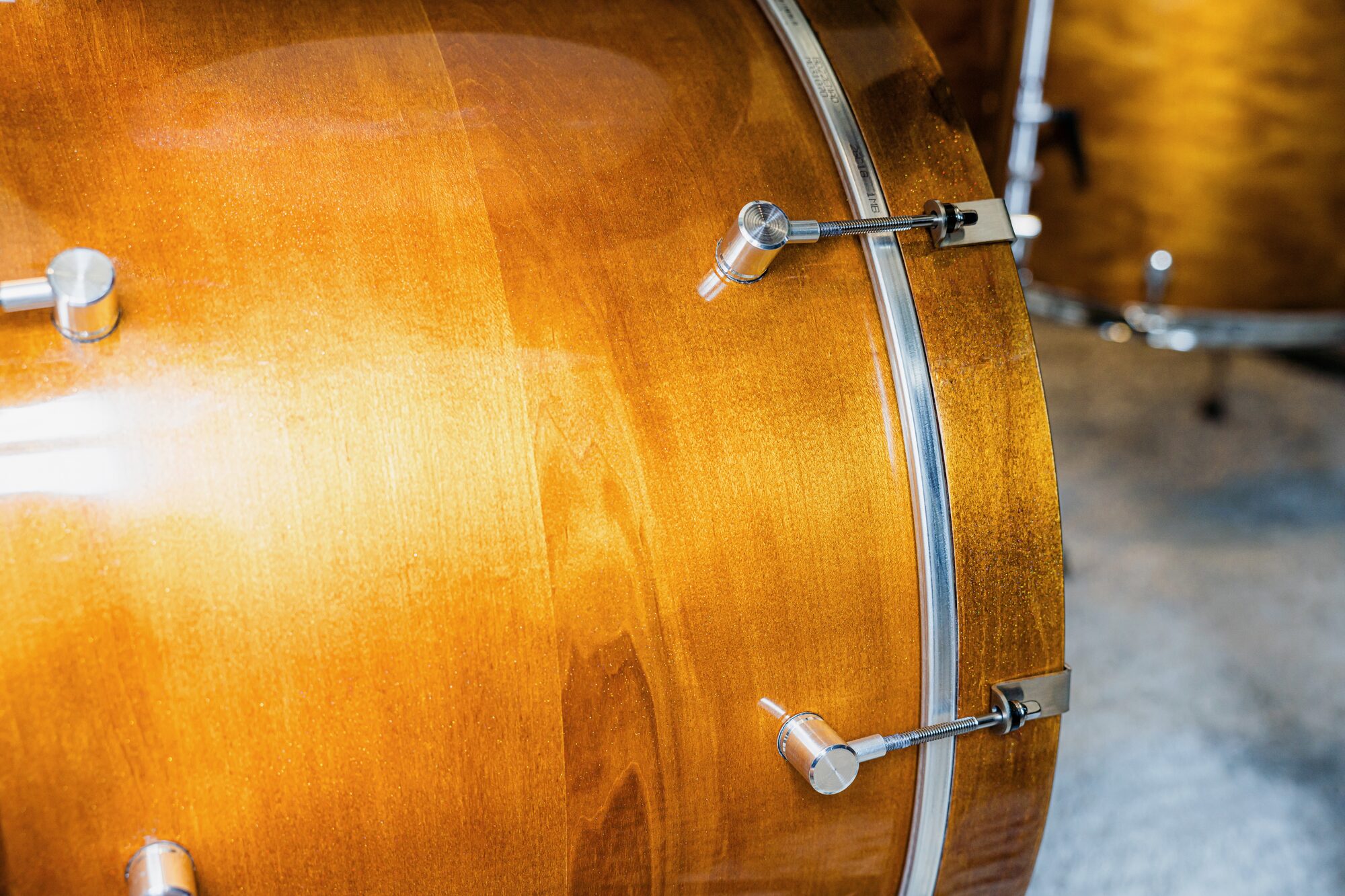 Honey maple bass drum body — the finish in its full form